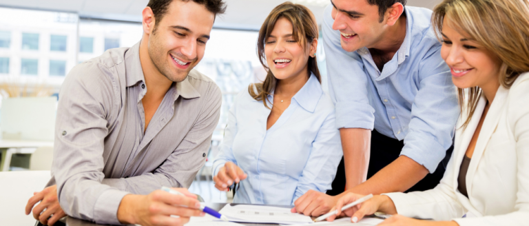 group of people working together smiling