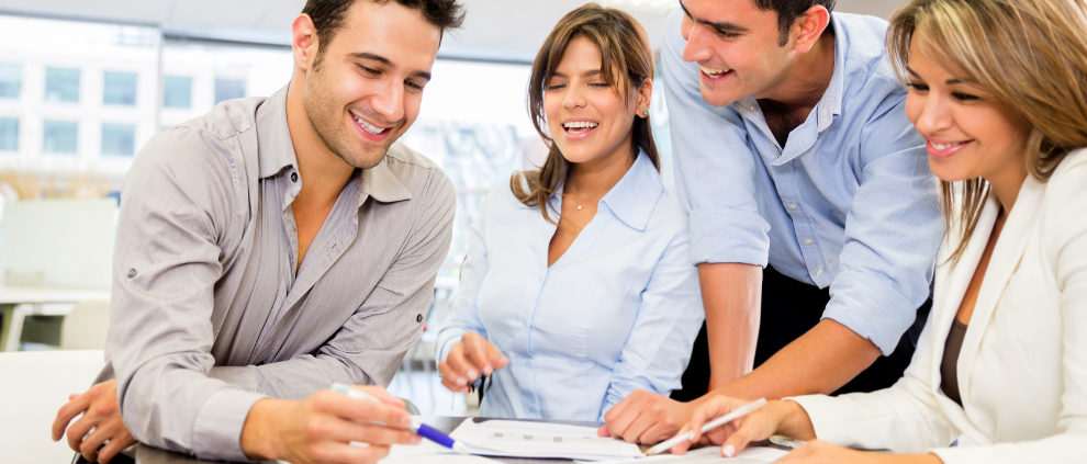 group of people working together smiling